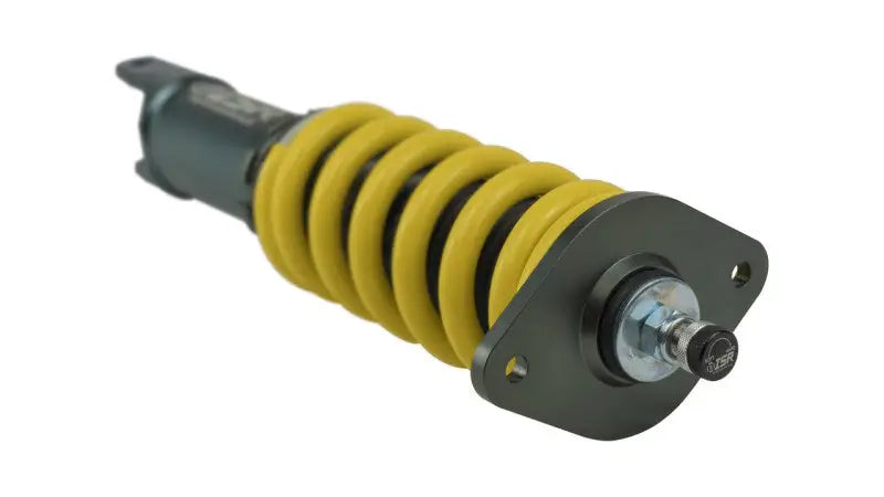Yellow coil-over shock absorber from ISR Performance Pro Series Coilovers for Nissan 350z Z33