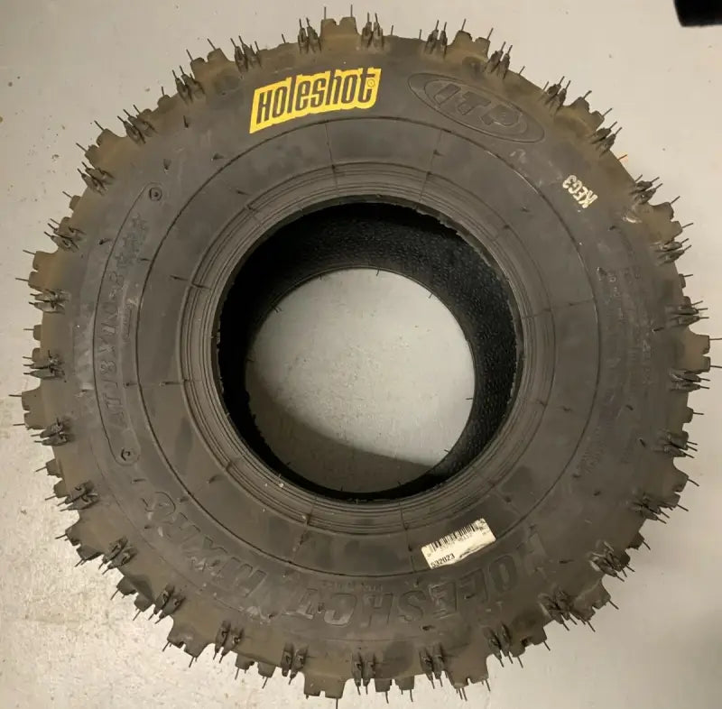 Studded Holeshot tire on ITP Tires Holeshot MXR6 18x10x8 for off-road fun