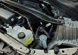 Ford Explorer engine compartment with J&L 2020 EcoBoost oil separator in view