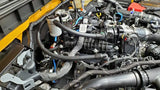 Automobile engine compartment with J&L Ford Bronco 2021-2022 oil separator on passenger side