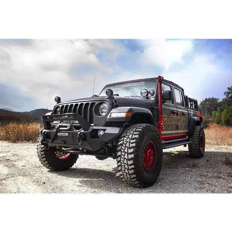Go Rhino Jeep featuring the Jack Mount Hi-Lift Jack, mounted to driver side front quarter panel, in black mild steel finish.