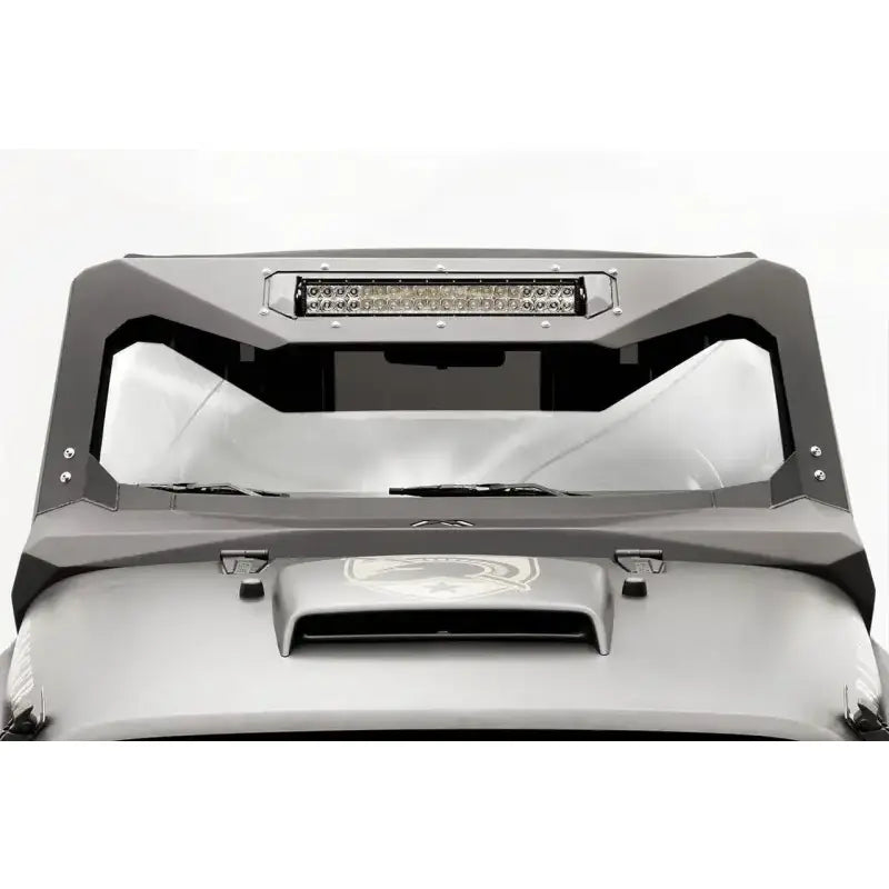 Fab Fours JK3022-1 Vicowl Inst 20 installed on a Jeep Wrangler JK (2007-2016), showcasing a sleek, durable visor with integrated LED light bar for enhanced appearance and protection.