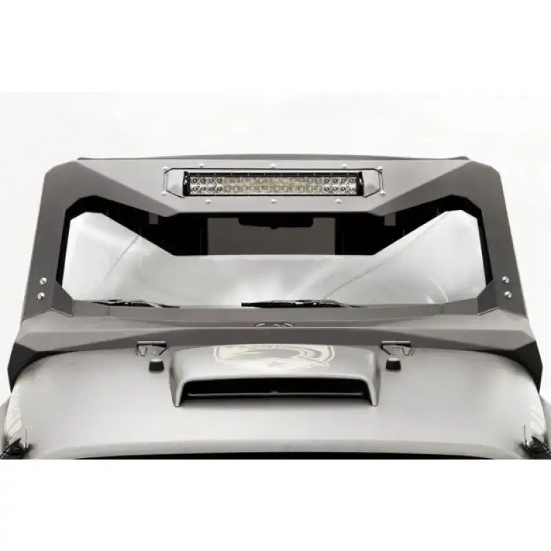 Fab Fours JK3022-1 visor installed on Jeep Wrangler JK 2007-2016, enhancing appearance and providing protection.