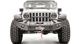 Front view of a Jeep equipped with the JL18-B4652-1 Fab Fours Lifestyle Winch Bumper with Guard, showcasing rugged off-road appearance and integrated winch.