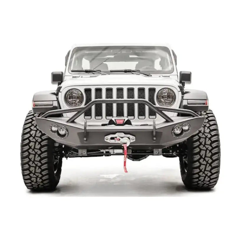 JL18-B4652-1 Fab Fours Lifestyle Winch Bumper with Guard installed on a rugged off-road vehicle’s front.