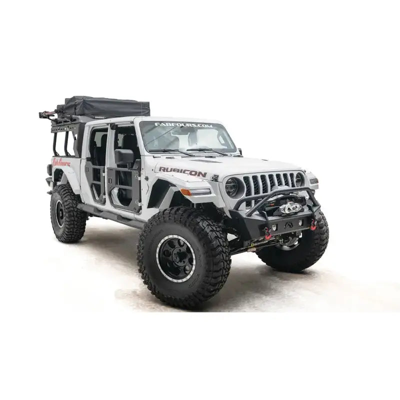 JL18-B4752-1 Fab Fours Jl/Jt Stubby With Pre-Runner Guard installed on a white Rubicon Jeep, showcasing superior off-road capabilities and aggressive styling, perfect for RV, automotive, powersports, marine, exterior, truck accessories, interior, truck bed, RV parts, Bumpers, Grilles & Guards, AVADA - Best Sellers, Must Haves