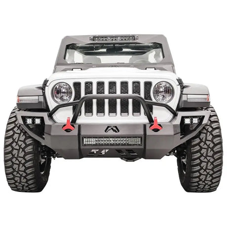 Front view of Jeep equipped with Fab Fours Vengeance W/ Pre-Runner, showcasing aggressive pre-runner styling and enhanced protection.