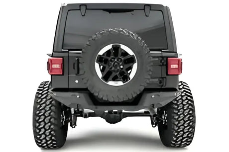 Fab Fours 18 Jp Jl Rear Base on Jeep Wrangler, showcasing enhanced rear protection and rugged style.