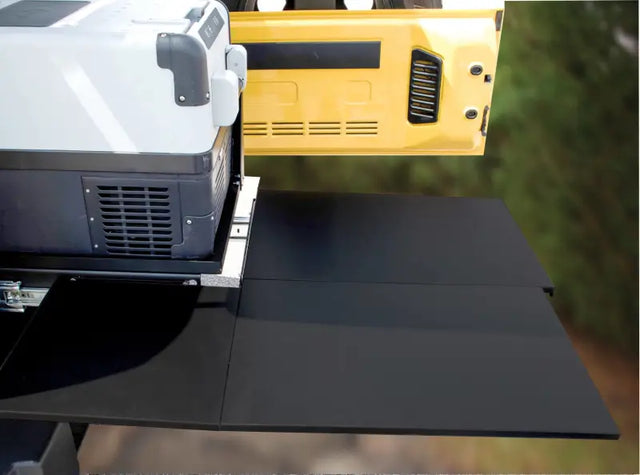 Portable fridge on fold-out counter in Mor Ryde Trail Kitchen for easy outdoor cooking