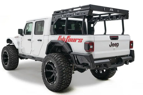 JT20-Y1950-1 Fab Fours Gladiator Rear bumper on white Jeep Rubicon, showcasing superior protection, aggressive styling, and rugged off-road durability.