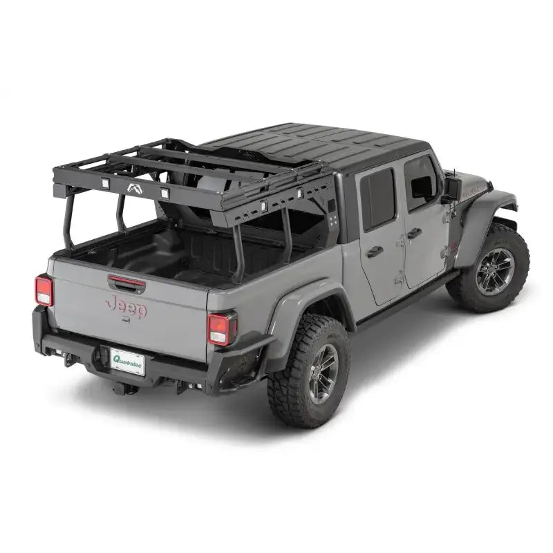 JTOR-01-1 Fab Fours Gladiator Overland Rack installed on a gray Jeep Gladiator showcasing its durable construction, ample storage, custom fit, enhanced utility, and sleek design.