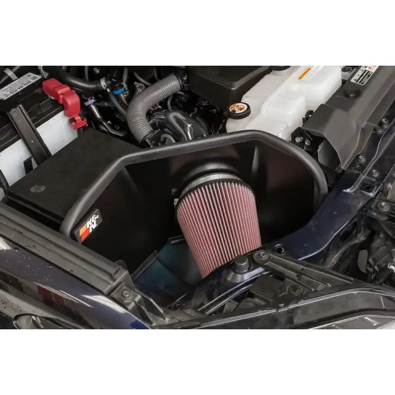 K&N 2022 Toyota Tundra V6-3.5L F/I Performance Air Intake System installed under the hood, featuring a mandrel-bent aluminum intake tube and high-flow air filter with a custom heat shield.