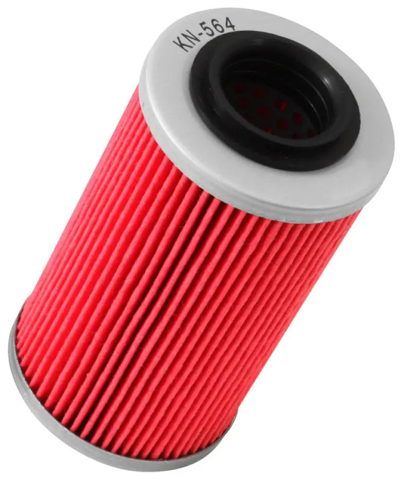 Red cylindrical oil filter.
