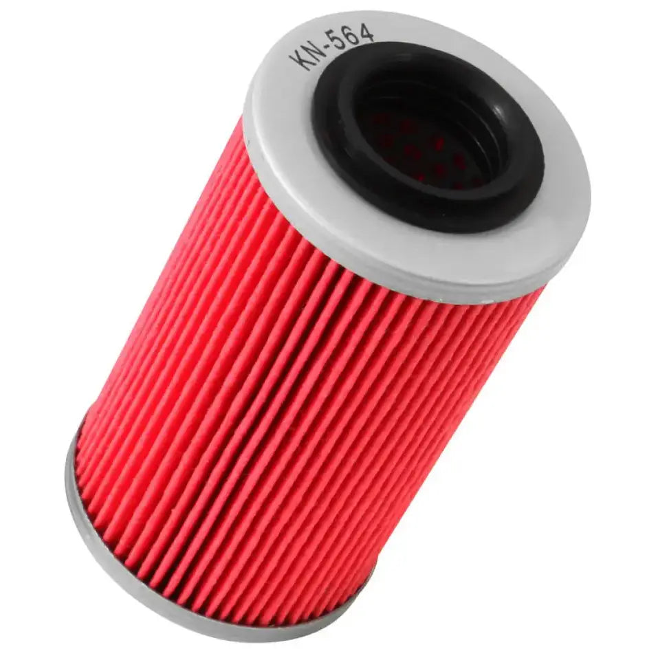Red cylindrical oil filter.
