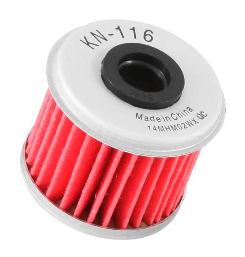 Red and white K&N oil filter for Honda Husqvarna with 1.625in OD x .438in ID