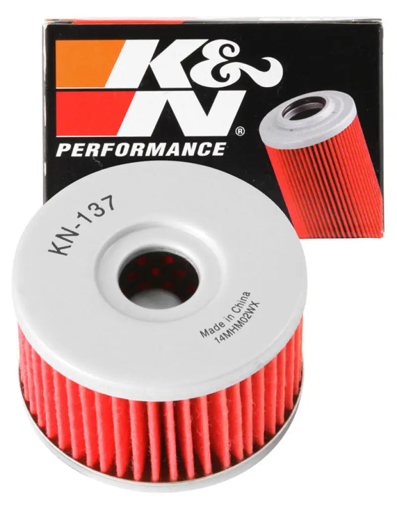 K&N Suzuki 2.375in OD x 1.469in H Oil Filter - High-performance K&N Powersports Cartridge Oil Filter with modern synthetic filter media and outstanding filtration, boxed and unboxed product display.