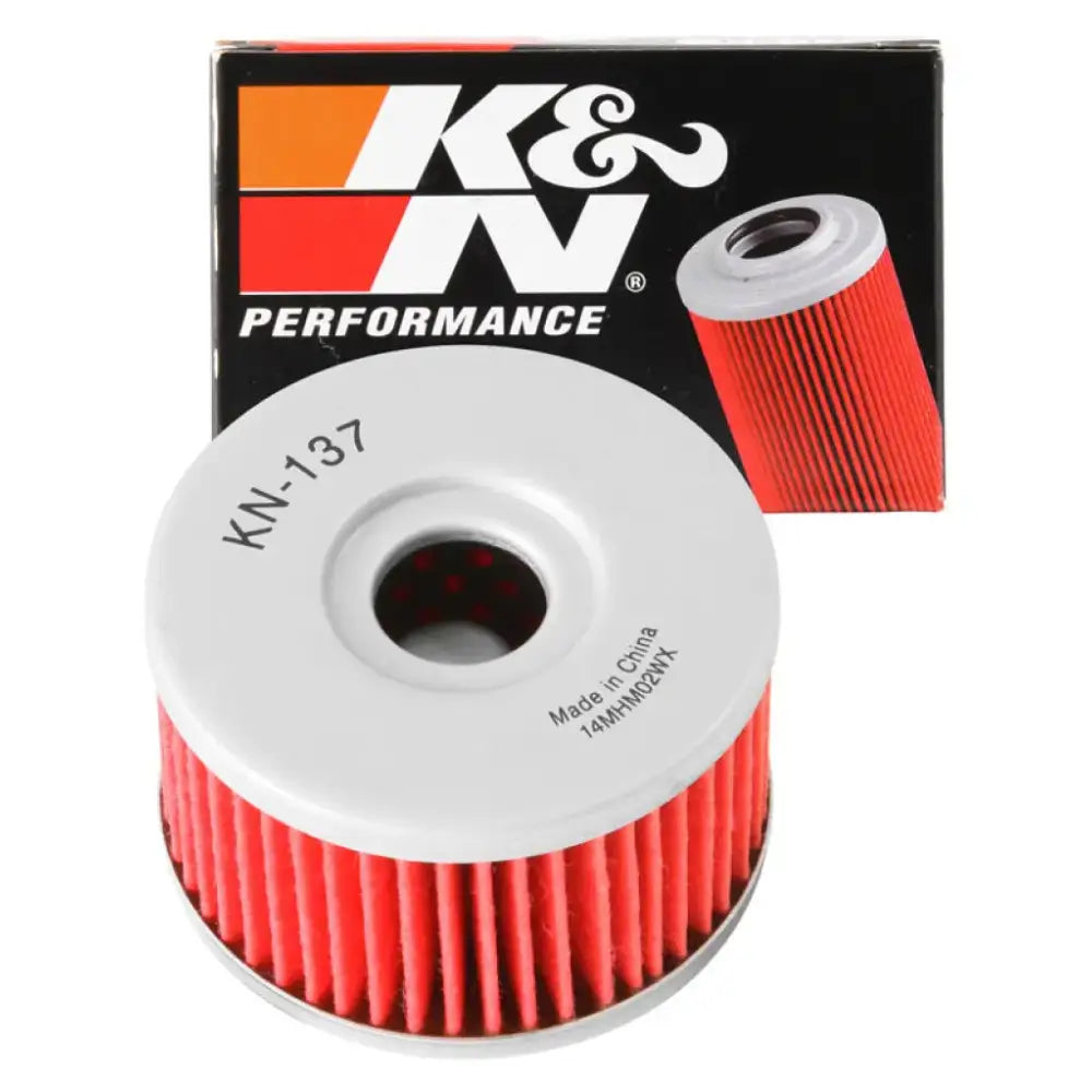 K&N Suzuki 2.375in OD x 1.469in H Oil Filter - High-performance K&N Powersports Cartridge Oil Filter with modern synthetic filter media and outstanding filtration, boxed and unboxed product display.