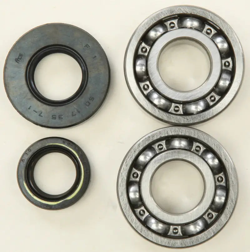 Two ball bearings and main bearing seal from K089 Bearing Seal Kit for machinery