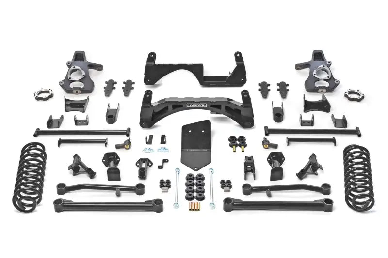 K1018 Fabtech Lift Kit Suspension components arranged on a white background, designed for superior performance, increased ground clearance, and durability.