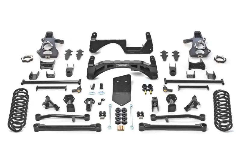 K1018 Fabtech Lift Kit Suspension parts layout showcasing superior performance, increased ground clearance, durable construction, and enhanced style for off-road vehicles.