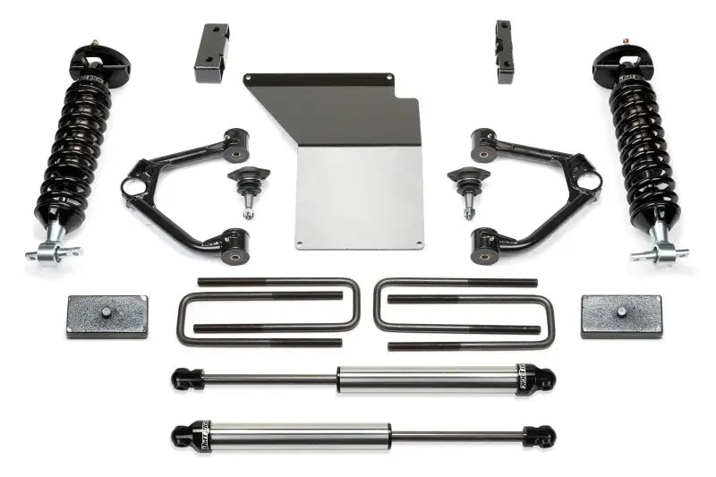 K1070DL Fabtech Lift Kit Suspension components, enhancing off-road capabilities and providing significant lift for improved ground clearance and vehicle performance.