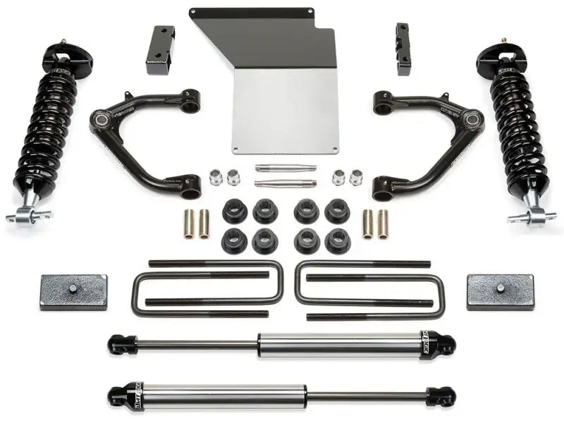 K1071DL Fabtech Lift Kit Suspension components including shocks, control arms, brackets, and hardware for enhanced vehicle performance and style.