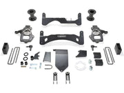 K1094 Fabtech Lift Kit Suspension components laid out for installation, showcasing increased ground clearance and larger tire capability for enhanced off-road performance.