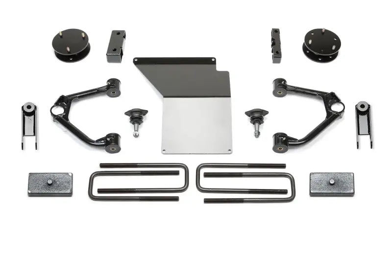 K1097 Fabtech Lift Kit Suspension components arranged in an organized layout, showcasing high-quality materials and off-road performance enhancements.