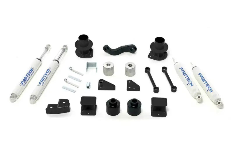 K4037 Fabtech Lift Kit Suspension components laid out, designed for enhanced off-road capability, improved ground clearance, and increased stability.