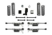 K4108DL Fabtech Lift Kit Suspension parts laid out, including springs, shock absorbers, and mounting components.