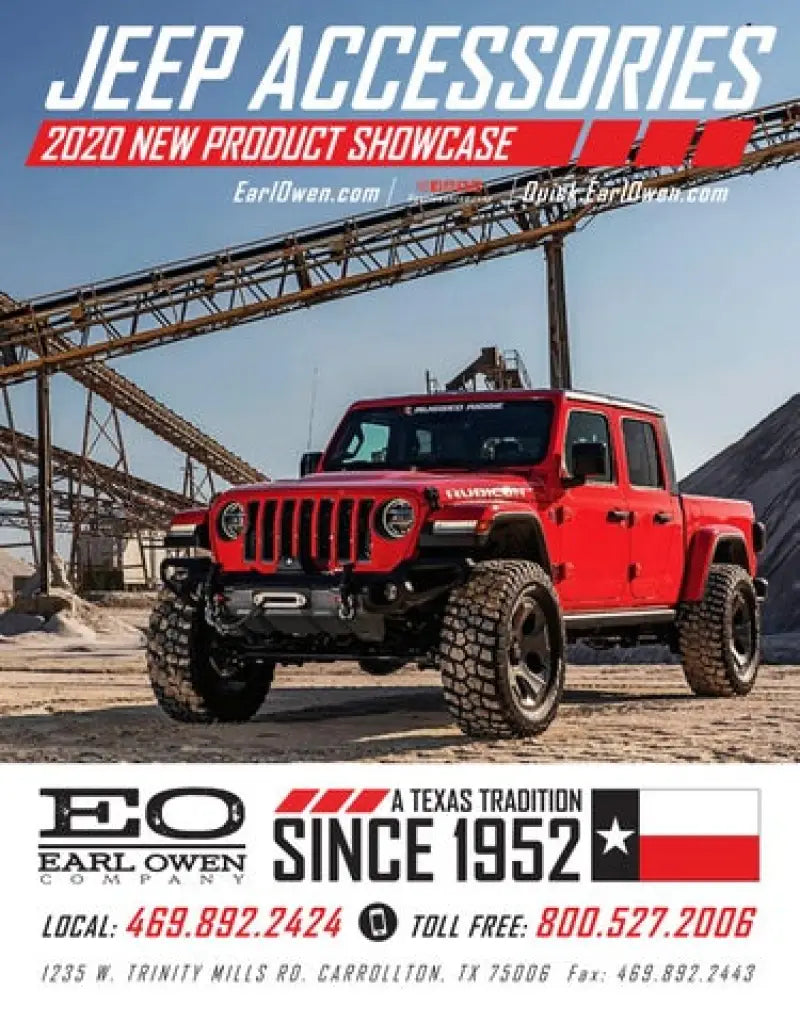 Red Jeep Wrangler JL 4WD 4-door equipped with Fabtech 3' trail performance shocks showcased in a rugged terrain setting with industrial backdrop.