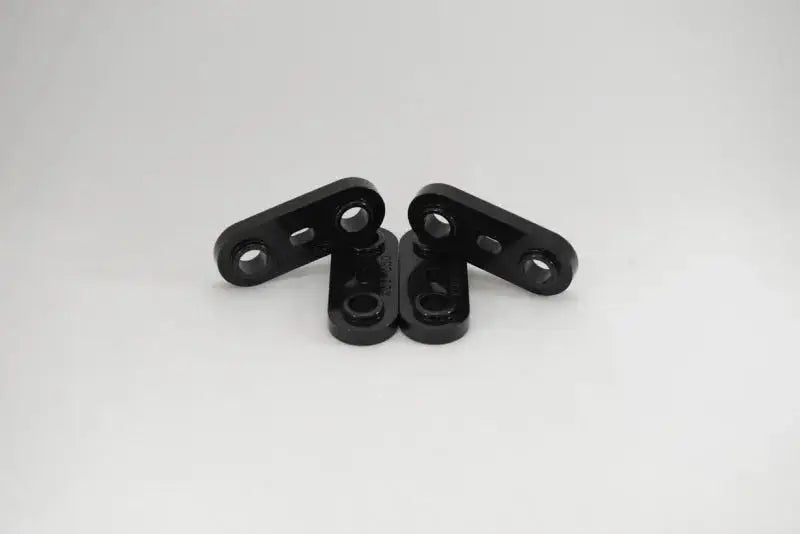 Four black metal links for Kartboy BRZ transmission bushing insert upgrade