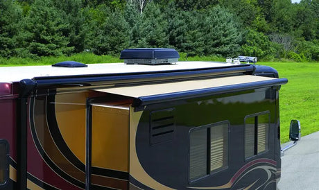 Recreational vehicle with awning showcasing KB07062JV42 Carefree Ascent Cvr 70 Black Pbl