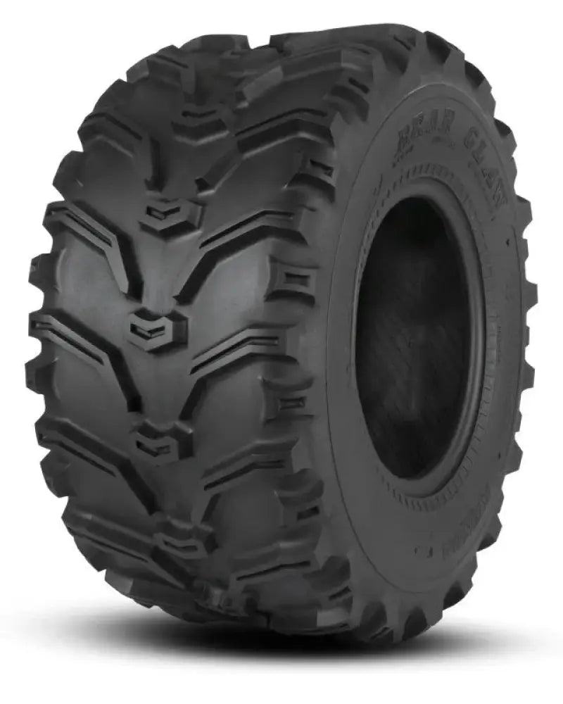 Black off-road tire with aggressive tread from Kenda K299 Bear Claw Rear series