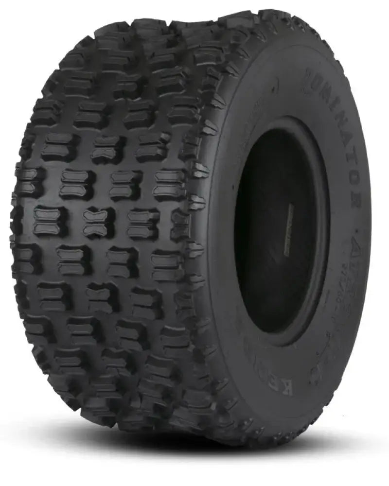 Black Kenda K300 Dominator rear tire with off-road knobby tread pattern for traction