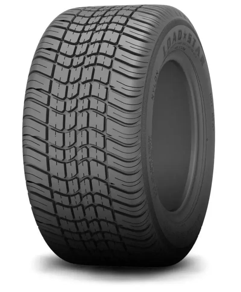 Gray tire with tread showcasing Kenda K399 Load Star low profile bias tires