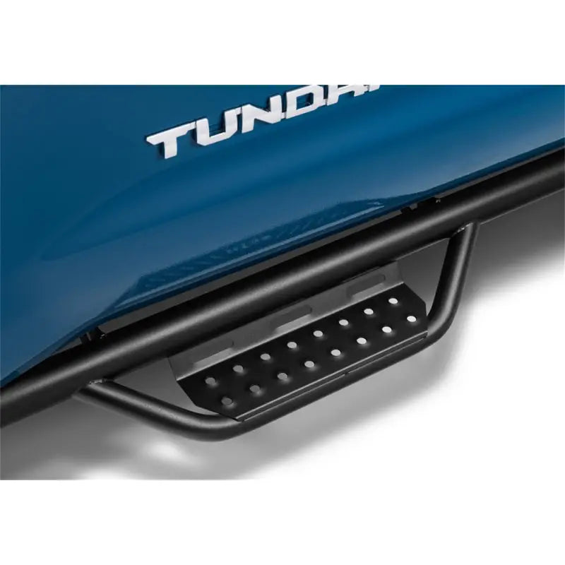 Keystone 519418012 Nerf Bar With Drop Down Steps; 2 Inch Round Bent; Black Textured Powder Coated; Steel; Without End Caps; Rocker Panel Mount