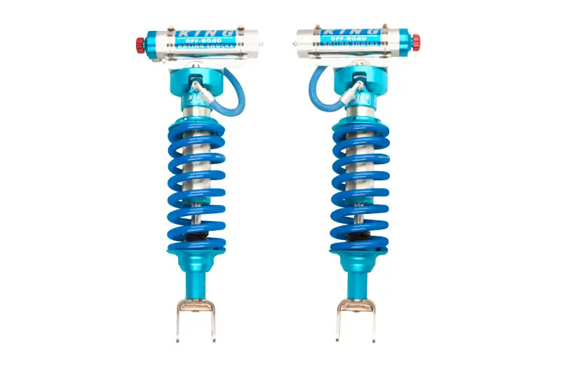 Vibrant blue King Shocks 2.5 dia remote reservoir coilover pair for Ram 1500
