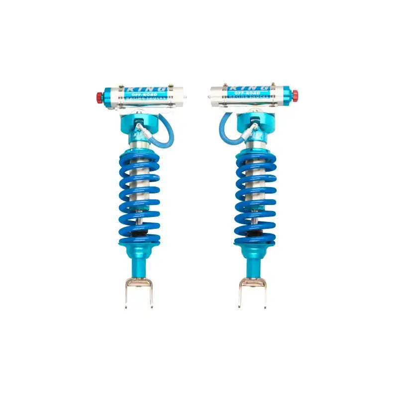 Vibrant blue King Shocks 2.5 dia remote reservoir coilover pair for Ram 1500