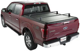 2019 Ford F-150 XLT pickup with black vinyl tonneau cover and silver roof rack, KMN182 Pace Edwards Ultragroove Metal Kit