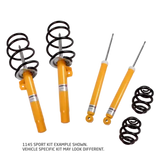 Yellow shock absorbers with black springs.