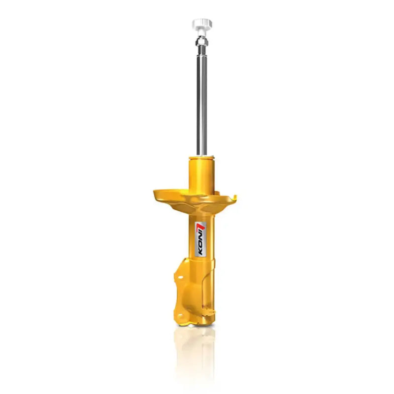 Yellow automotive shock absorber.