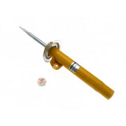 Yellow KONI shock absorber with adjustment cap.