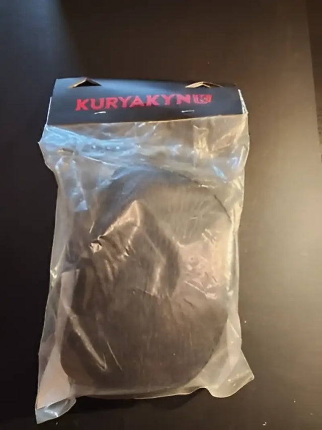Kuryakyn black leather knee pad on backrest for plug & play sissy bar