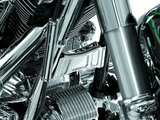 Chrome motorcycle engine detail showcasing Kuryakyn Downtube Cross Brace Cover 99-13 Touring