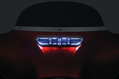 Chrome Kuryakyn fairing vent accent on 2019 BMW M5 rear light