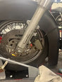 Motorcycle front wheel assembly with Kuryakyn Mesh Caliper Covers Black for style
