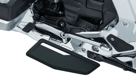 Kuryakyn Omni Driver Floorboards Chrome showing motorcycle footrest with chrome accents