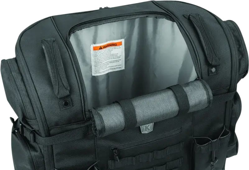 Open black motorcycle luggage bag on Kuryakyn Pet Palace Titan for easy pet travel