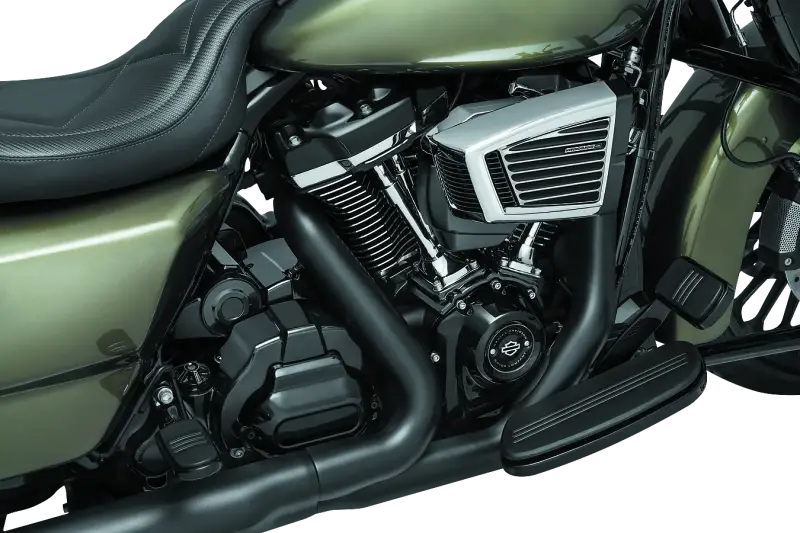 Motorcycle engine with Kuryakyn Precision Tappet Block Accent Black 6440